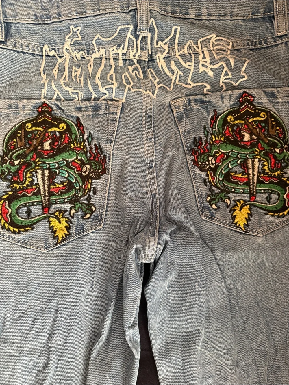 Relaxed Light Blue Denim Jeans with Red & Yellow Pocket Accent